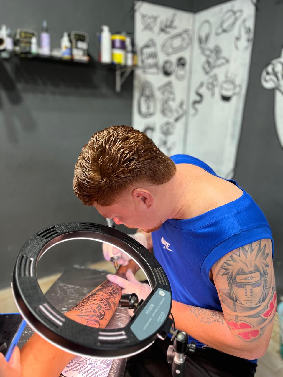 Foto do tatuador